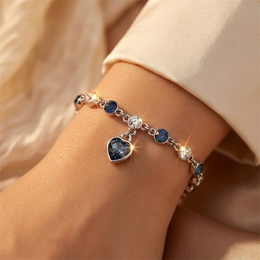 Zilverkleurige Schakelarmband Met Saffier Hart