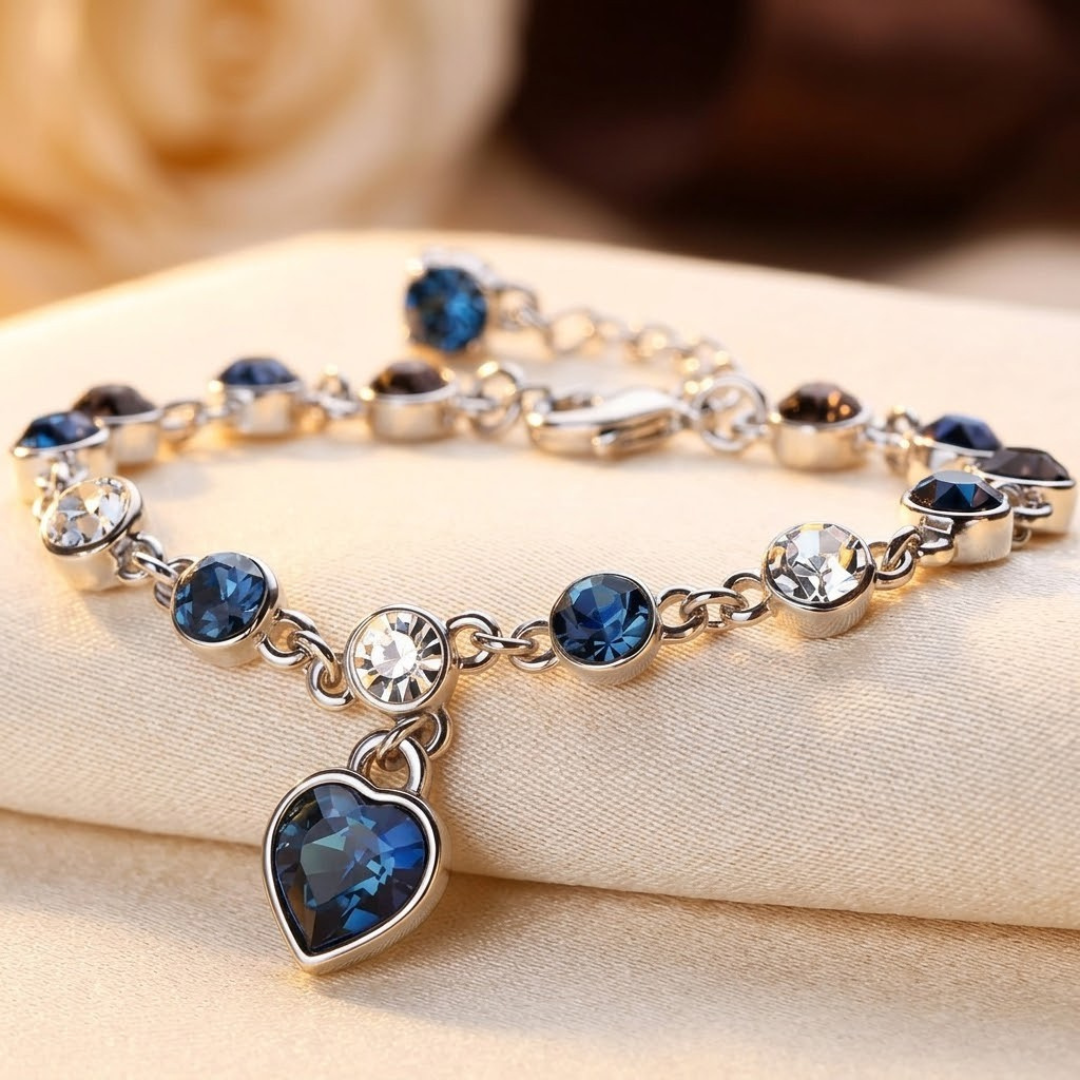 Zilverkleurige Schakelarmband Met Saffier Hart